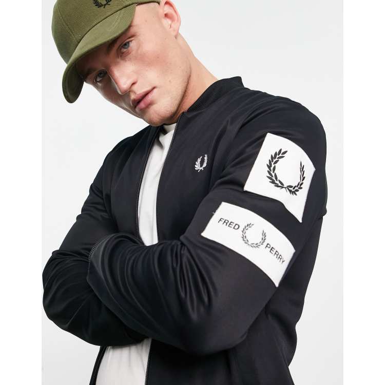 Fred Perry badge track jacket in black ASOS