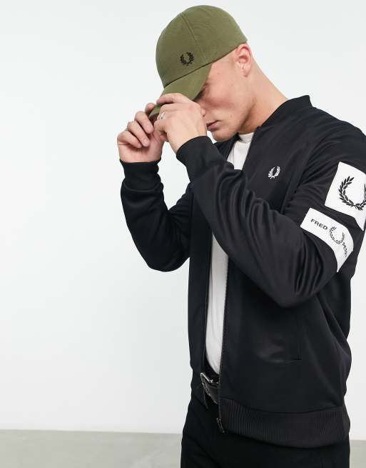 Fred Perry badge track jacket in black