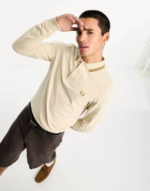 Fred Perry - Beige poloskjorte med lange ærmer og to kontraststriber ved kanten