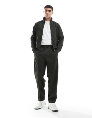 Fred Perry Fred Perry co-ord track joggers in dark green with taping