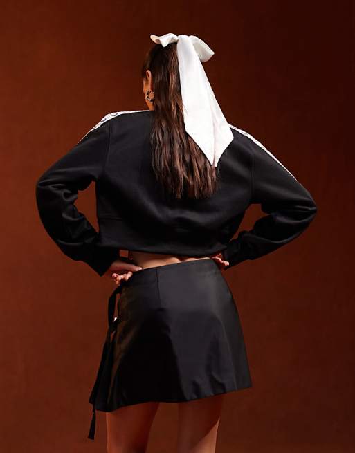 Fred Perry cropped taped track jacket in black | ASOS Fred Perry cropped taped track jacket in black | ASOS