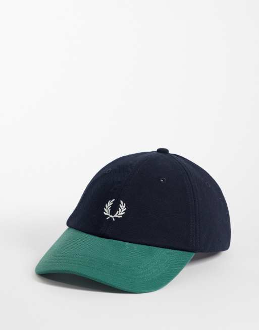 Fred Perry - Gorra azul marino y blanca con diseño color block de piqué