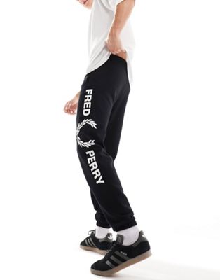 Fred Perry graphic branded joggers in black