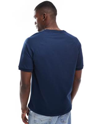 Fred Perry jacquard pique T-shirt in blue | ASOS