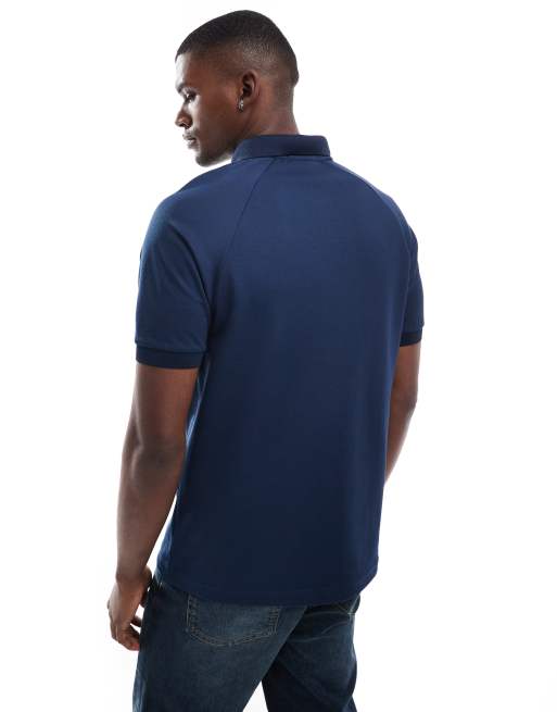 Fred Perry jacquard zip sporty polo shirt in blue | ASOS