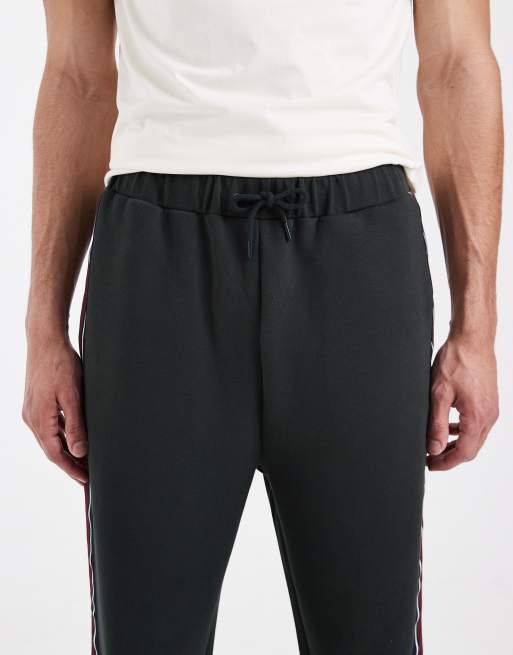Fred Perry - Pantaloni sportivi verde scuro a righe con fettuccia con logo, 4 di 5