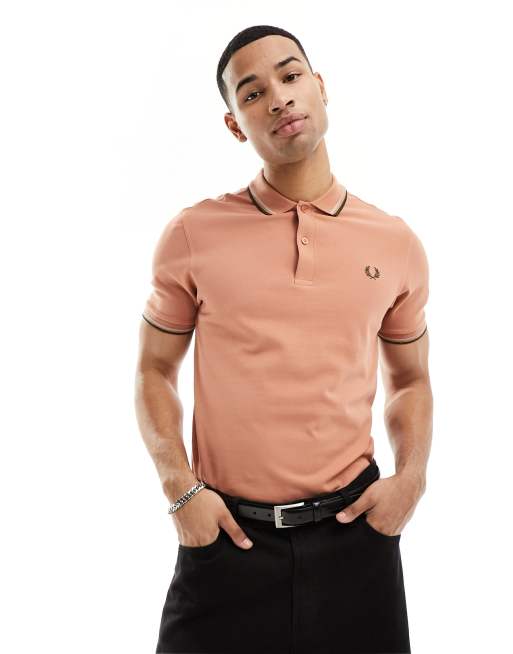 Fred Perry - Polo met een dubbel gekleurd randje in koraalkleur