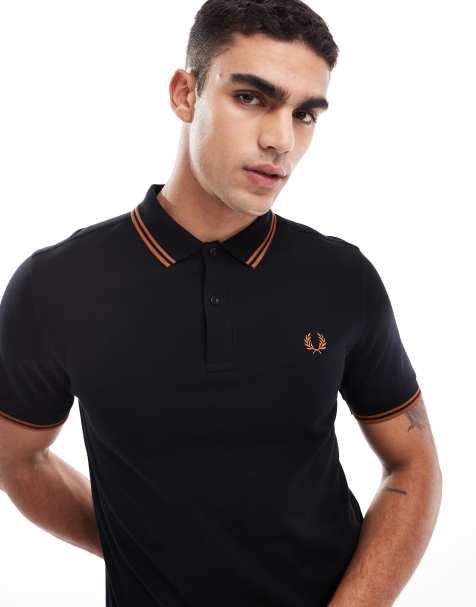 Fred Perry – Polohemd in Schwarz und Orange mit doppelten Zierstreifen - view 1