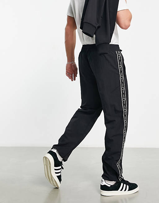 Fred Perry side taping shell sweatpants in black