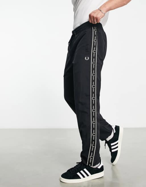 Fred Perry side taping shell sweatpants in black