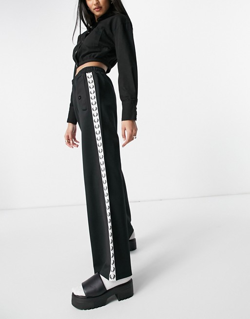 Fred Perry taped track pants in black