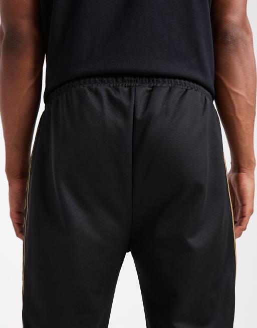 Fred Perry - Taps toelopende joggingbroek in zwart, 5 van 5