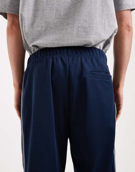 Fred Perry – Trainingshose in Blau mit Tramline-Logoband, 4 von 5