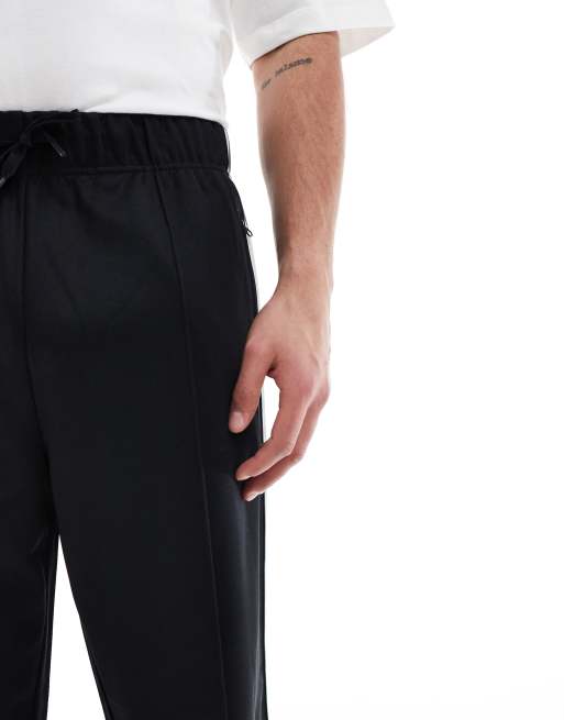Fred Perry – Trainingshose in Schwarz mit zweifarbigem Zierstreifen, Kombiteil, 5 von 5