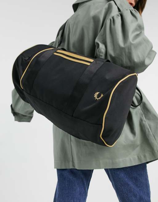 Fred Perry twin tipped barrel bag in black and gold