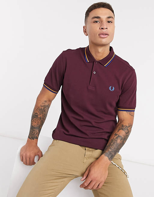 Perry twin tipped polo in burgundy/gold ASOS