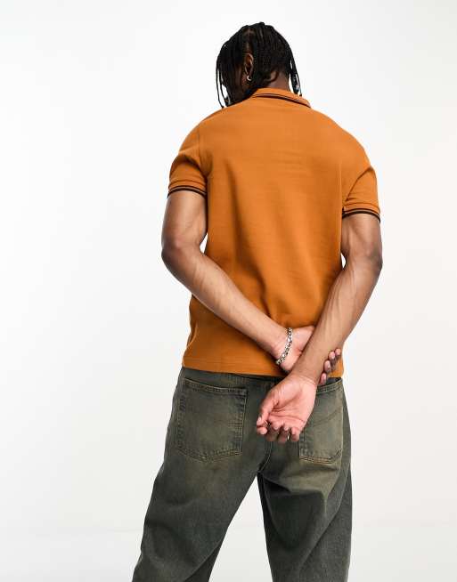 Fred perry black and orange best sale polo shirt