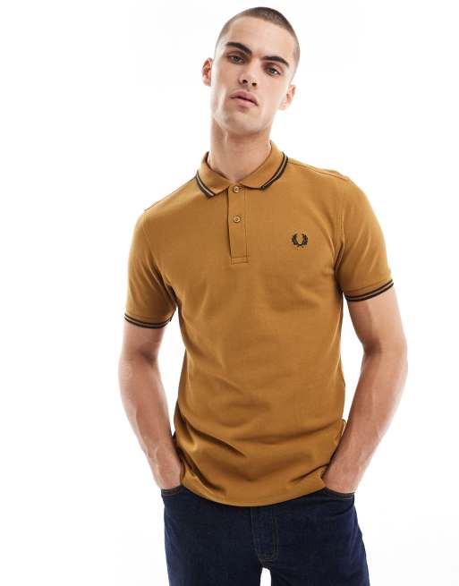 【大人カジュアル】FRED PERRY Gold Logo Brown Polo Shirt Fred Perry twin tipped polo shirt in light brown | ASOS
