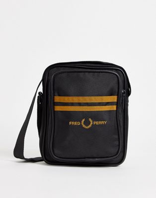 Fred Perry twin tipped x body bag in black/ gold