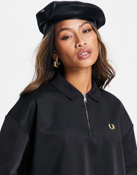 https://images.asos-media.com/products/fred-perry-woven-panel-polo-shirt-in-black/201655717-3?$n_550w$&wid=550&fit=constrain
