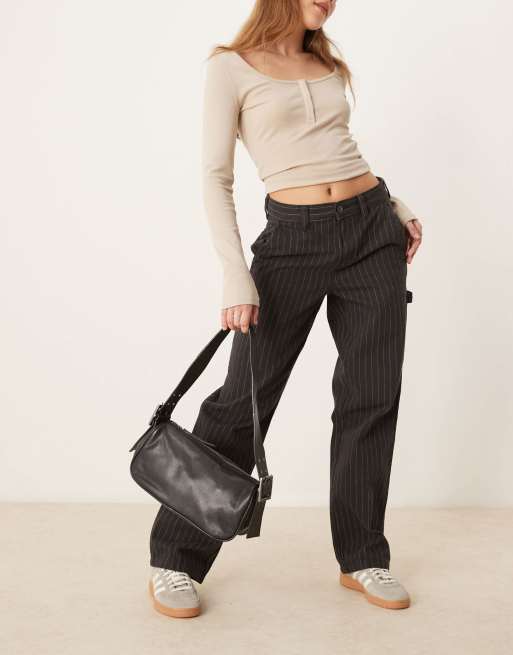 Free People arm candy leather shoulder bag in black | ASOS