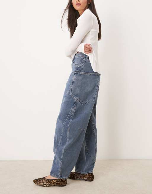 Free People barrel leg low-rise jeans in mid wash blue | ASOS
