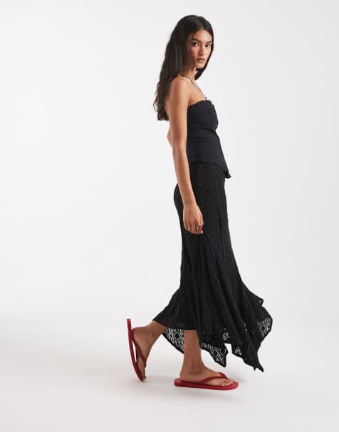 Free People bella lace asymmetric hem midi skirt in black