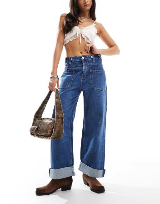 Free People - Blå og løse mid rise-jeans med forlomme