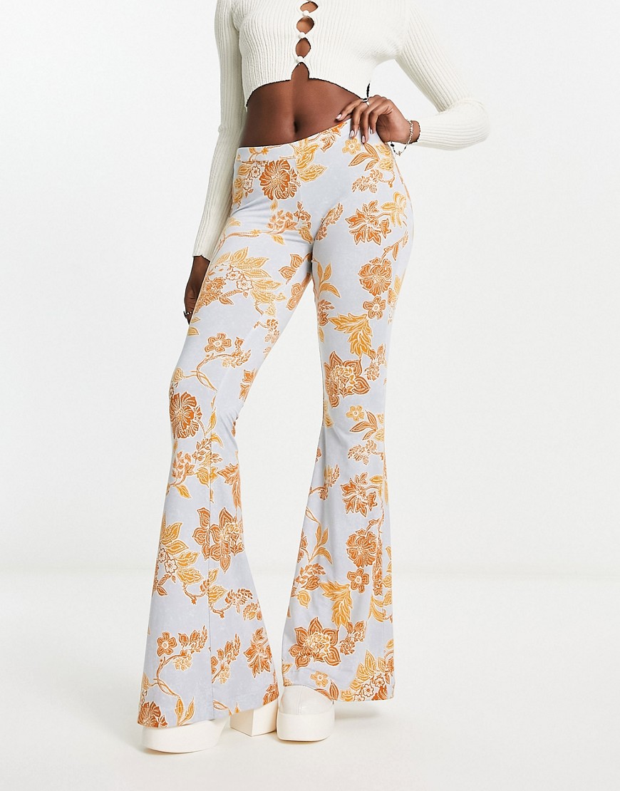 Free People bloom floral slinky flared trousers in light blue