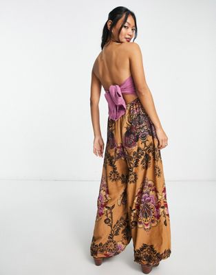Free People bow back paisley print bandeau jumpsuit in gold and pink