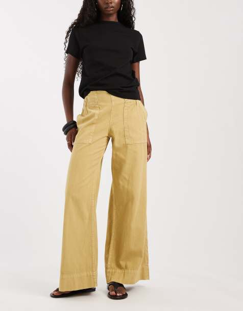 Free People Breezy low rise flare pull on pants in mustard - view 1