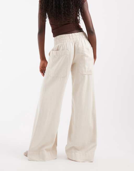 Free People breezy low rise flare pull on trouser in ivory, 4 of 5