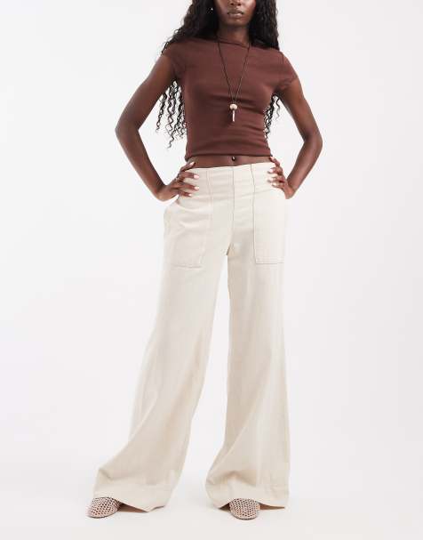 Free People Breezy low rise flared pull-on pants in ivory - view 1
