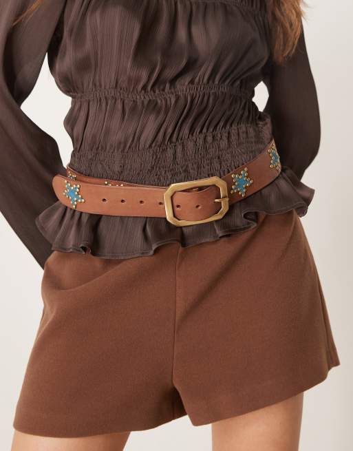 Free People - Cintura in pelle color bronzo con stelline con borchie