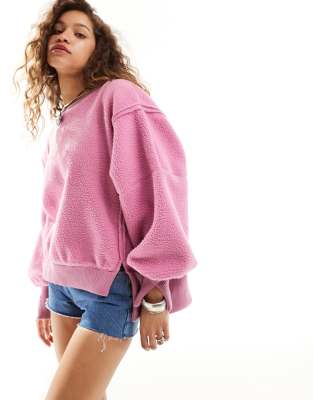 Shop Free People Cozy Oversized Fleece Sweater In Pink