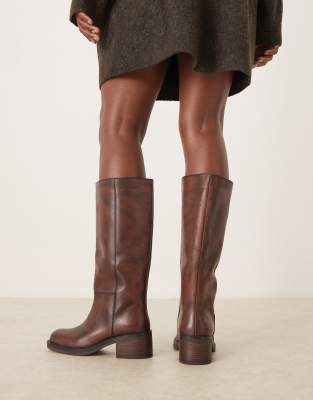 Free People Dana Distressed Pull On Boots Cognac In Red