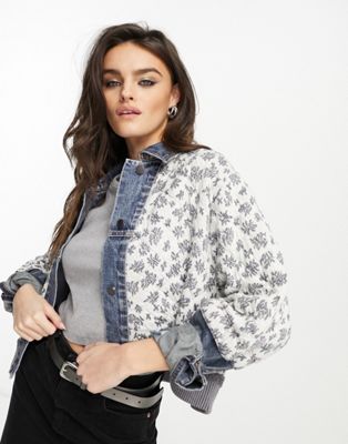Free People denim jacket with ditsy floral top layer in washed denim