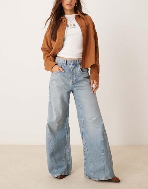 Free People – Eden – Ausgestellte Jeans in mittelblauer Waschung mit hohem Bund und lässigem Schnitt - view 1