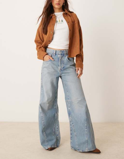 Free People Eden high waist slouchy flared jeans in mid wash blue