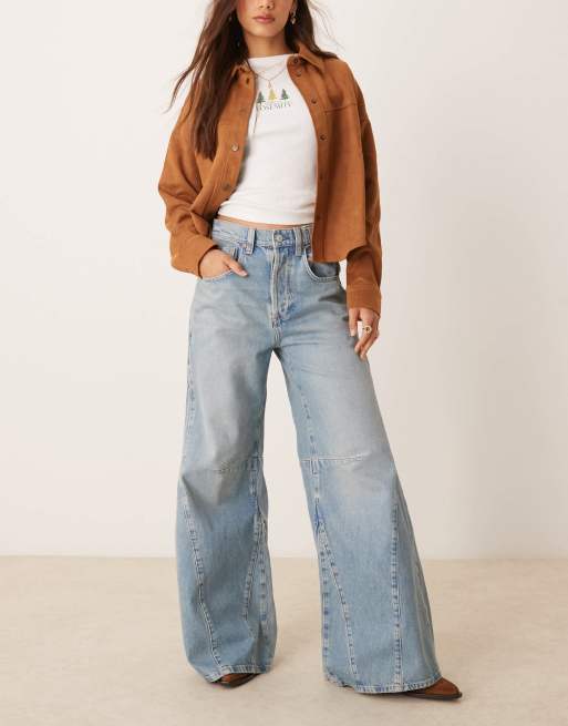 Free People Eden high waist slouchy flared jeans in mid wash blue
