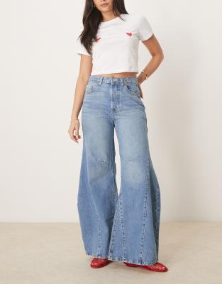 Free People - Eden - Weit geschnittene Baggy-Jeans in verwaschenem Mittelblau