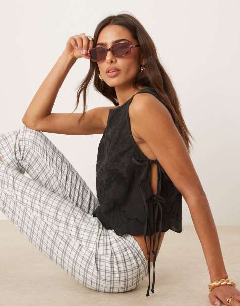 Free People embroidered detail tie-side tank in black - view 1