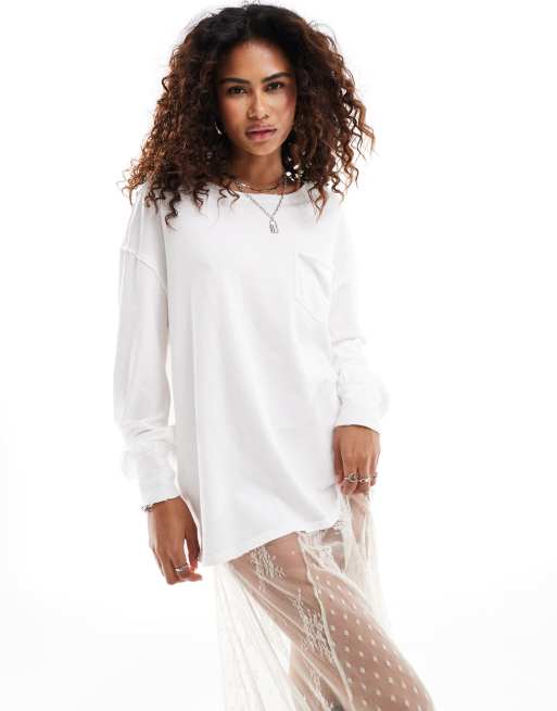 Free People – Fade – Benvit långärmad t-shirt med påsydd ficka