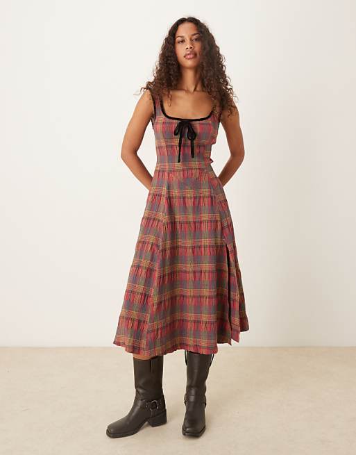 free people midi dress Bel Air with a sweetheart neckline and spaghetti straps Day Glow Midi Dress by