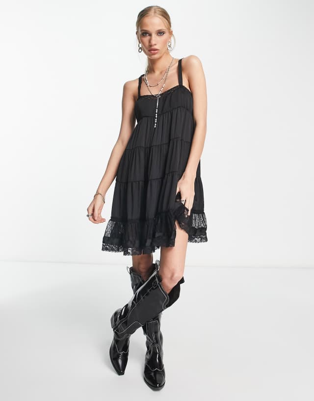 Free People Full Swing tiered mini dress in black