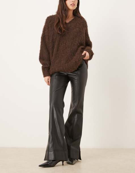 Free People – Glow Up – Czarne spodnie z rozszerzanymi nogawkami z imitacji skóry - view 1