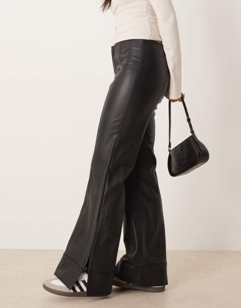 Free People Glow up vegan leather flared trousers in black - view 1
