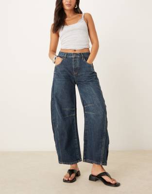 Free People - Good Luck - Jeans in Tiefblau mit mittelhohem Bund und abgerundetem Beinschnitt