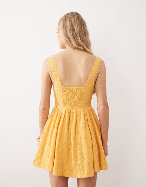 Free People – Gul miniklänning i korsettstil med v-ringning, 4 av 4