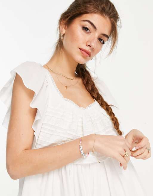 Free People hailey mini dress with frill sleeves and textured stripe | ASOS